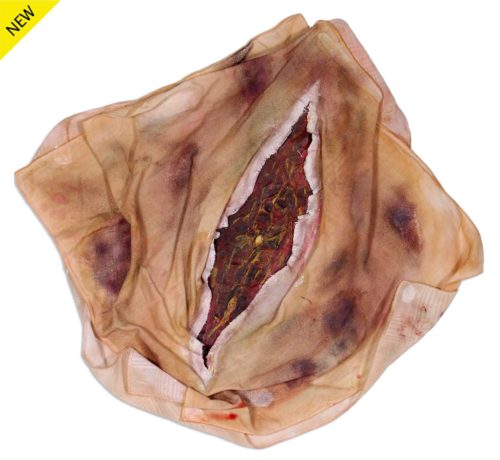 Mixed media of a cloth painted with makeup and folded in the shape of a vulva with a red vaginal opening and several red spots around it representing a carelessness event by Diana N. Collazo Hernández