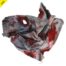 Mixed media of cloth with heart-like shape with large reddish spots and perforations